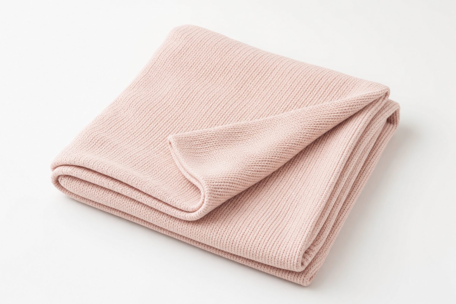 Folded blush bamboo baby swaddle blanket